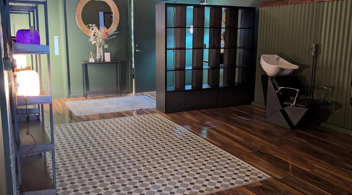 Modern interior at Lisa at Hubxx Salon in Dunmurry, Northern Ireland with chic decor and elegant flooring.