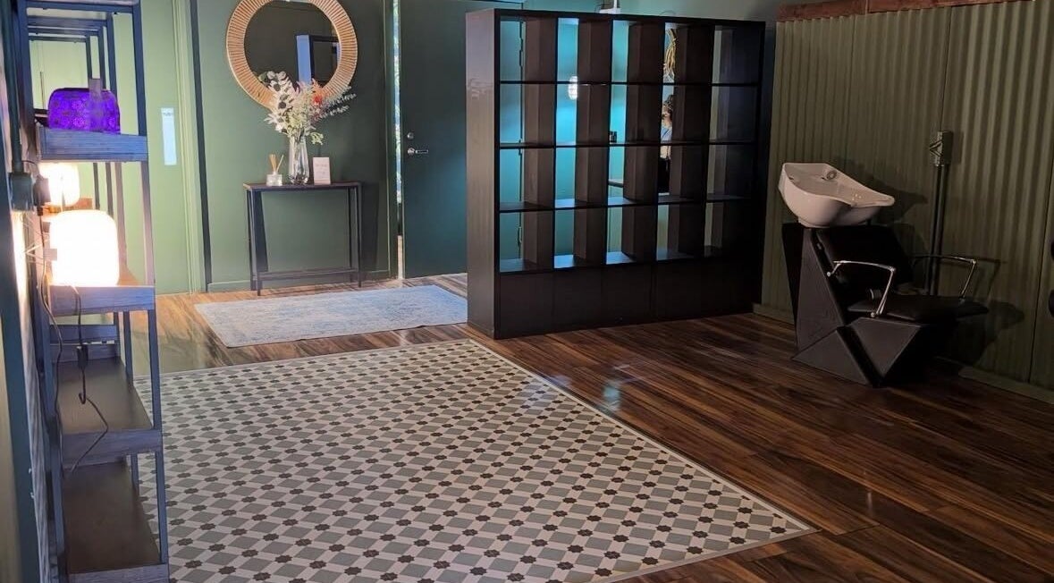 Modern interior at Lisa at Hubxx Salon in Dunmurry, Northern Ireland with chic decor and elegant flooring.