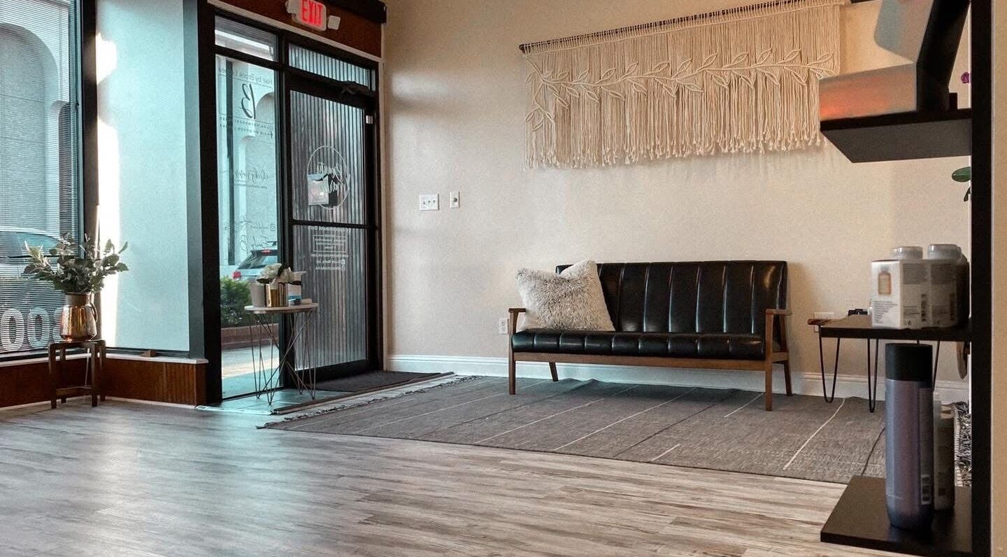 Chic reception area at Skin By Macie, Murray, Kentucky with modern decor and cozy seating.