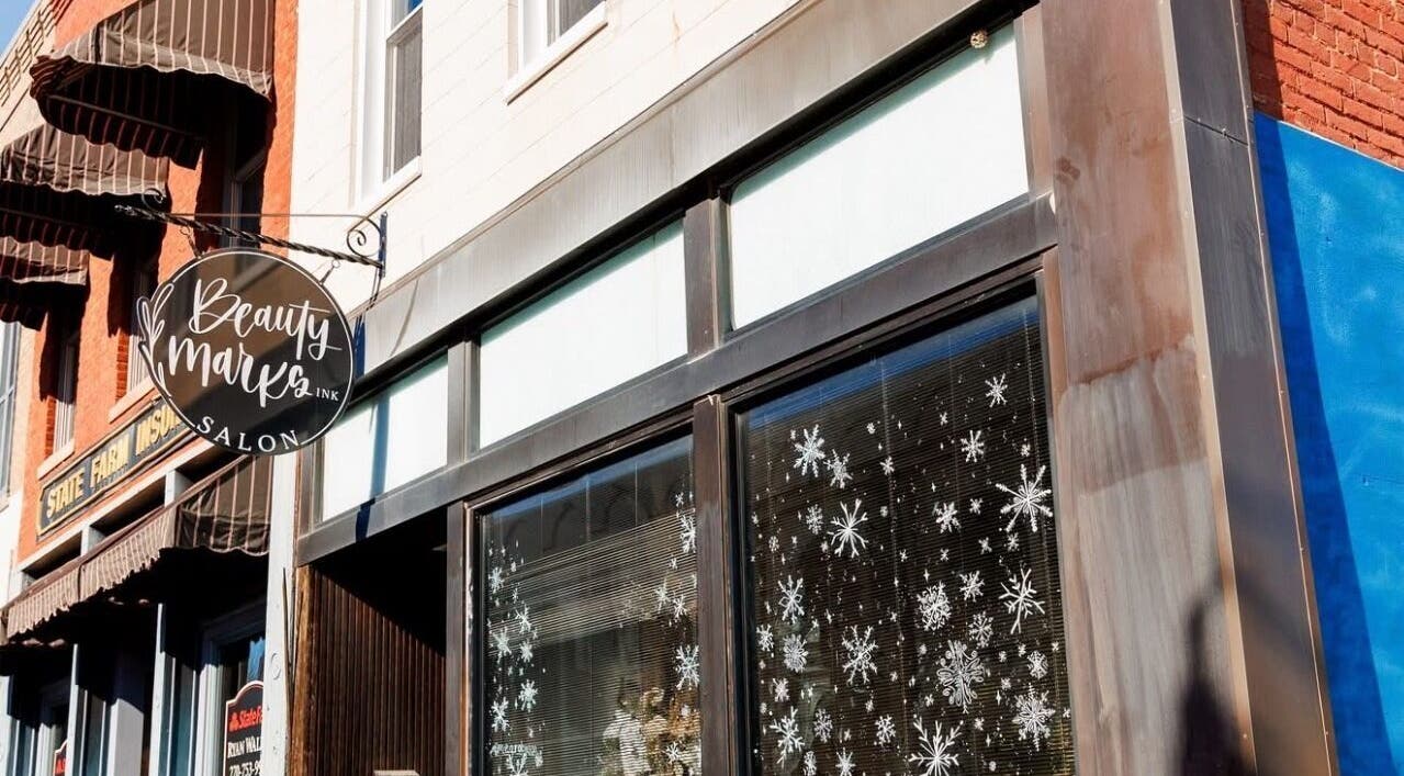 Front view of Skin By Macie, featuring a stylish exterior with snowflake decorations in Murray, Kentucky, US.