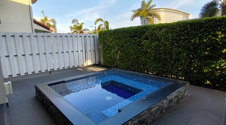 Tranquil courtyard with spa pool at Reevitalise Wellness, Muang Pattaya, Chang Wat Chon Buri, TH.