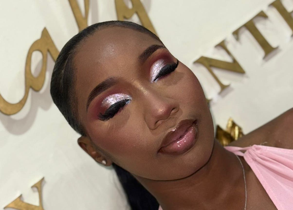 Elegant makeup at Emerald Empire in Willemstad, Curaçao, CW, showcasing bold eyeshadow and glossy lips.