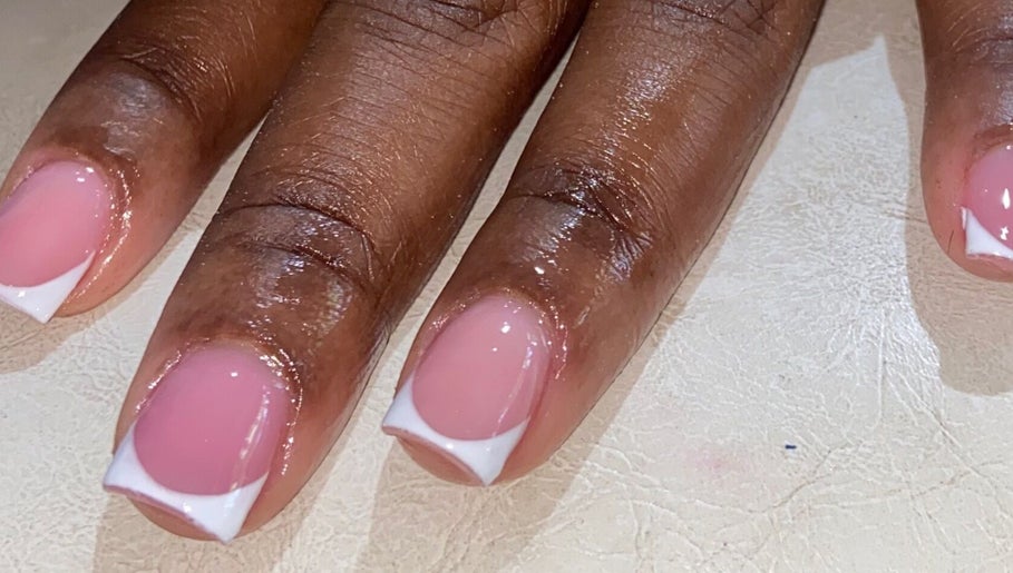 Classic French manicure at Paity's Nails in Portmore, St. Catherine Parish, JM. Elegant and timeless nail design.
