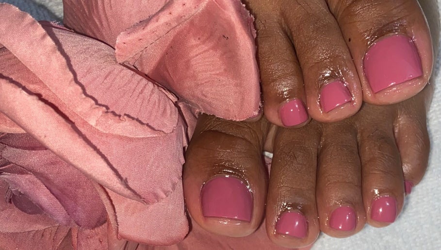 Elegant pink pedicure at Paity’s Nails in Portmore, St. Catherine Parish, JM, highlighting beauty and care.