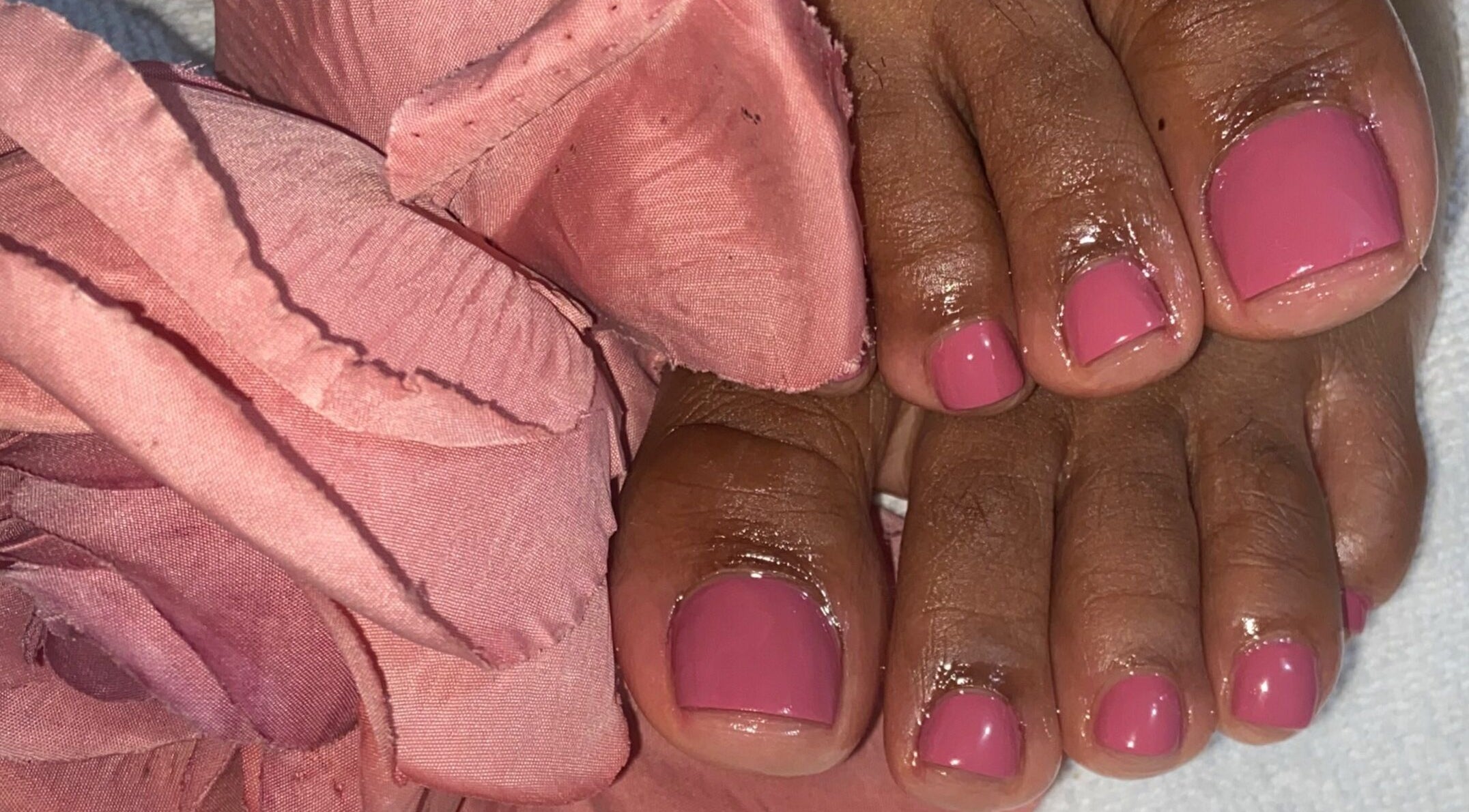 Elegant pink pedicure at Paity’s Nails in Portmore, St. Catherine Parish, JM, highlighting beauty and care.