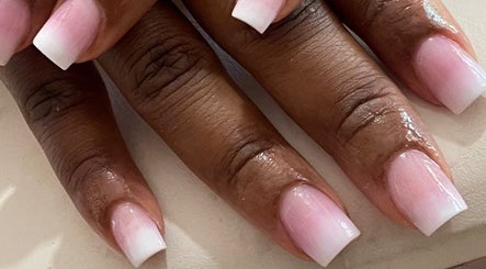 Elegant ombré nails from Paity’s Nails, Portmore, St. Catherine Parish, JM, showcasing expert polish application.