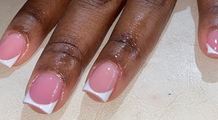 Beautiful French tip manicure at Paity’s Nails, Portmore, St. Catherine Parish, JM. Perfectly polished nails.