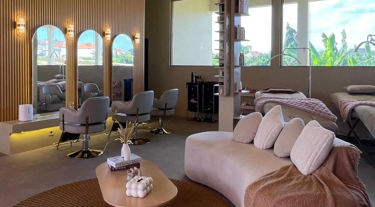 Elegant interior of Sara Anna Spa in Bali, Bali, ID, featuring cozy seating and chic styling stations.