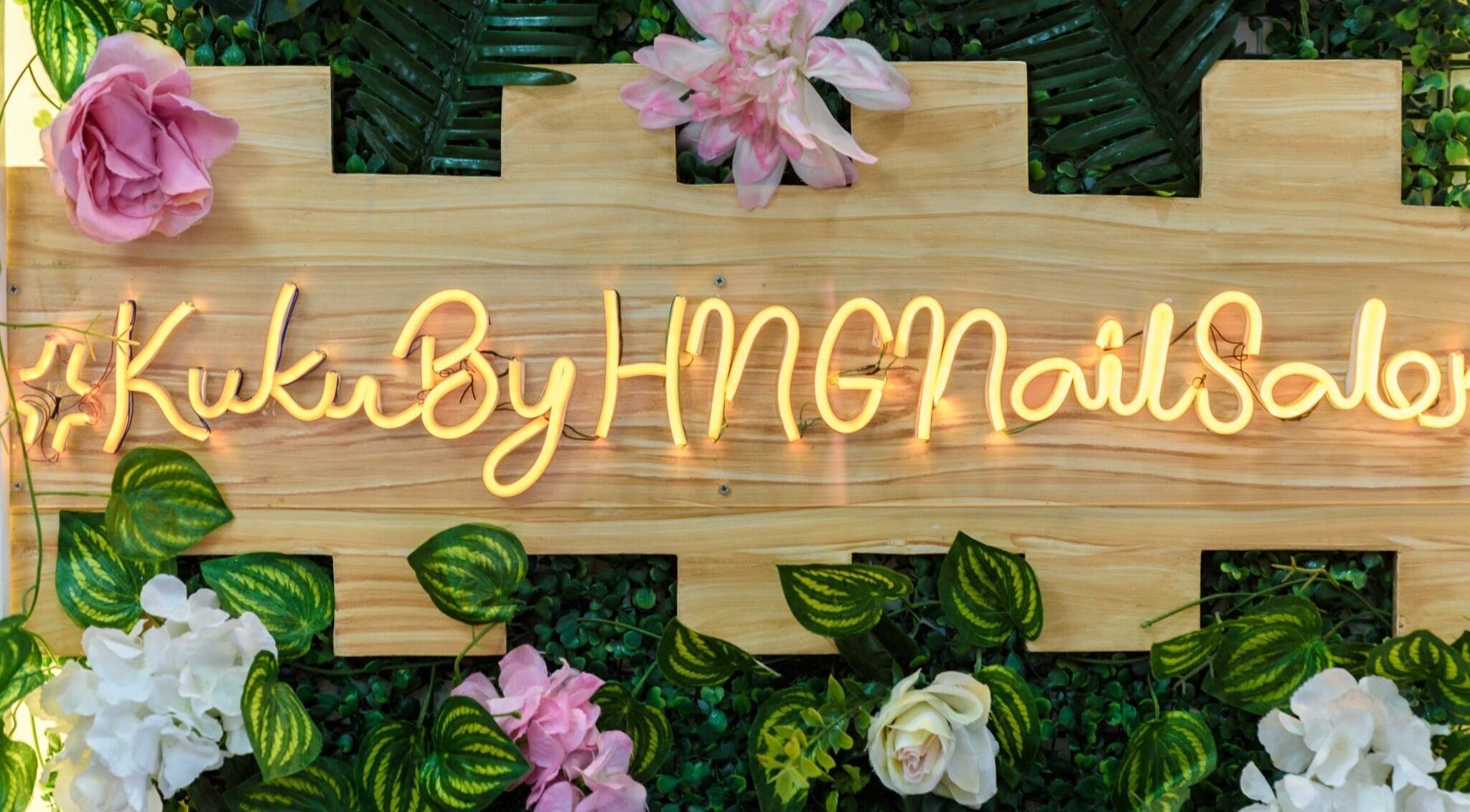 Floral neon sign of KUKU BY HNG BEAUTY SALON in Manila, Metro Manila, PH adds a touch of elegance.