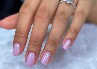 Exquisite pink manicure at Rosemarie Beauty Centre, Dubai, AE showcases sophisticated nail art.