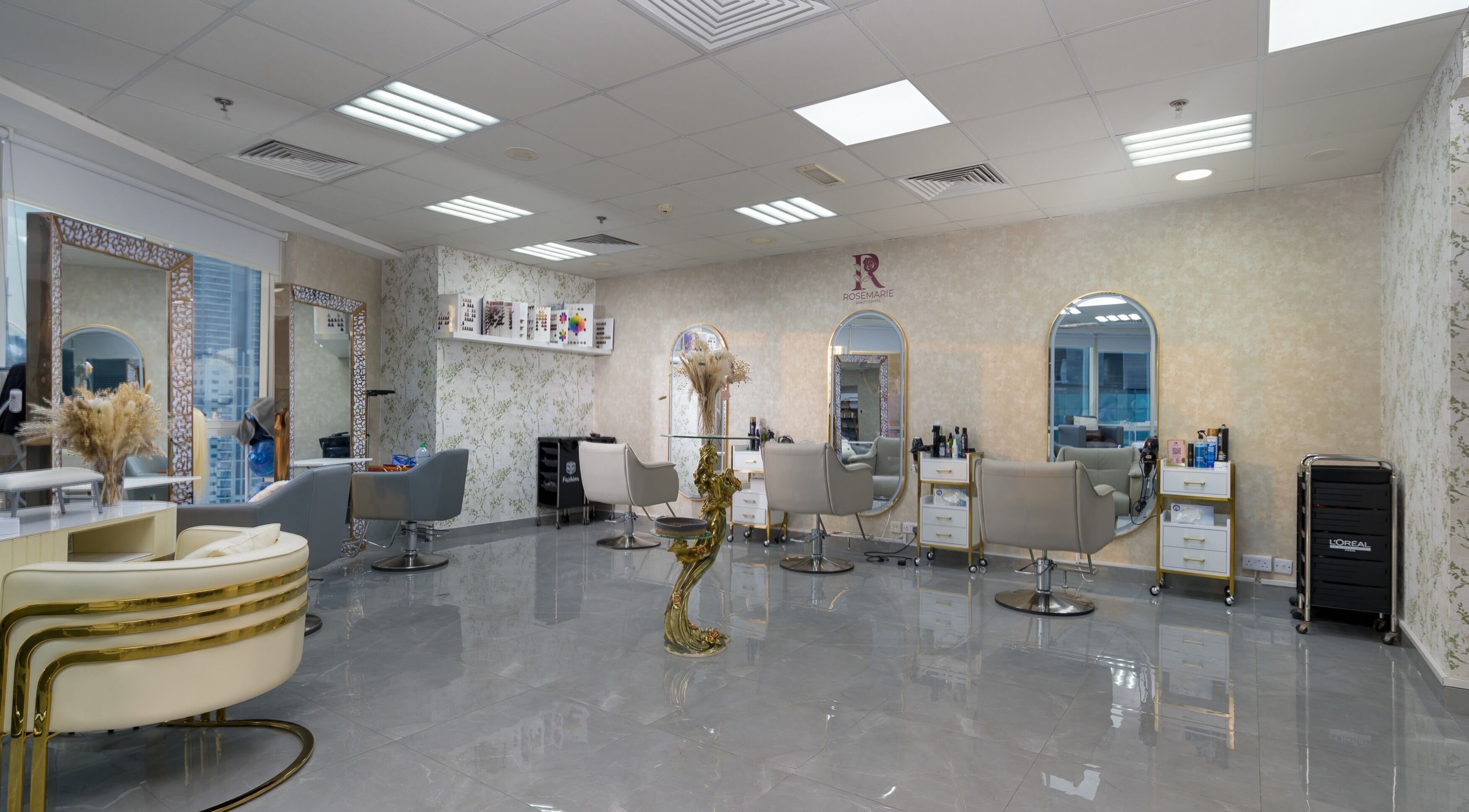 Modern salon interior at Rosemarie Beauty Centre, Dubai, AE showcasing elegant design and styling stations.