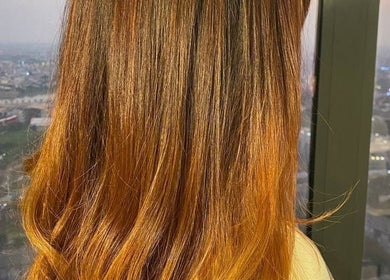 Stunning hair transformation at Sam Studio, located in Phnom Penh, Phnom Penh, KH, showcasing vibrant color.