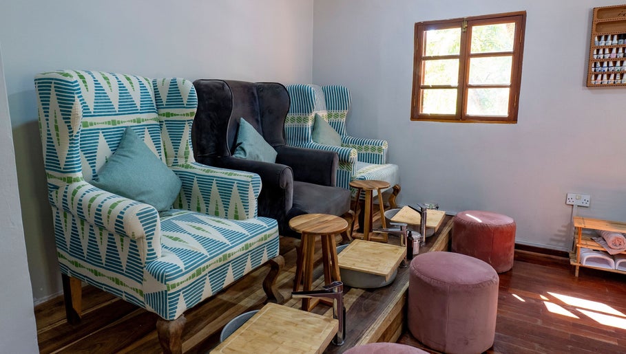 Relaxing pedicure area at Skin Africa Spa - Long Acres, Lusaka, Lusaka Province, ZM with plush seating.