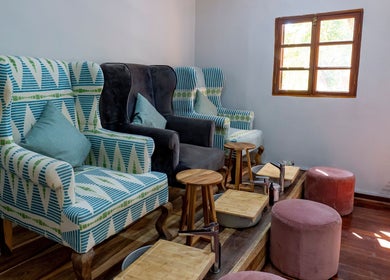 Relaxing pedicure area at Skin Africa Spa - Long Acres, Lusaka, Lusaka Province, ZM with plush seating.