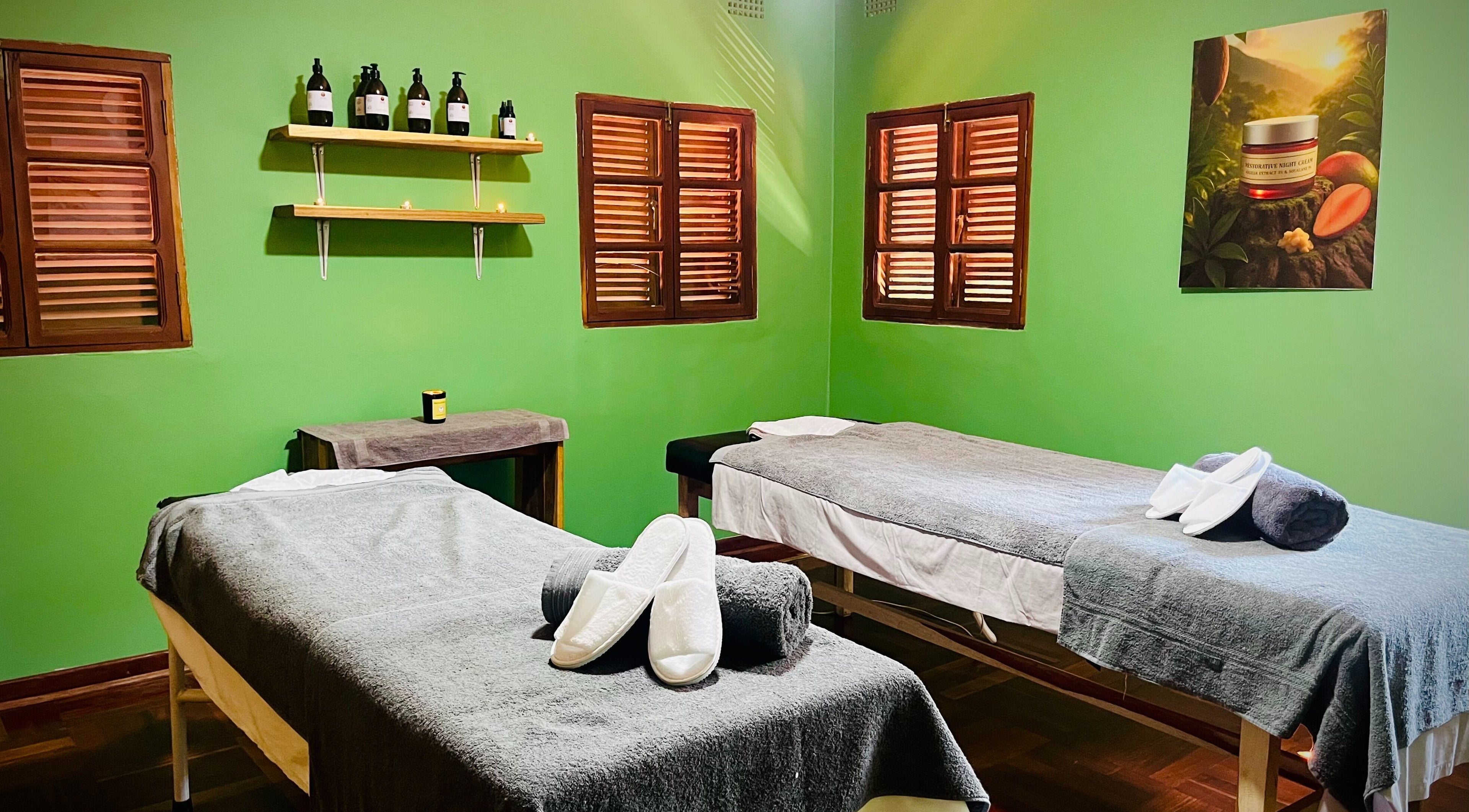 Relaxing treatment room at Skin Africa Spa - Long Acres, Lusaka, Lusaka Province, ZM with two massage beds.