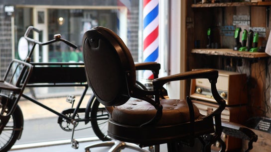 Vintage barber chair at Carlens Barbershop (Odense • Søndergade), Odense, DK showcases timeless elegance.