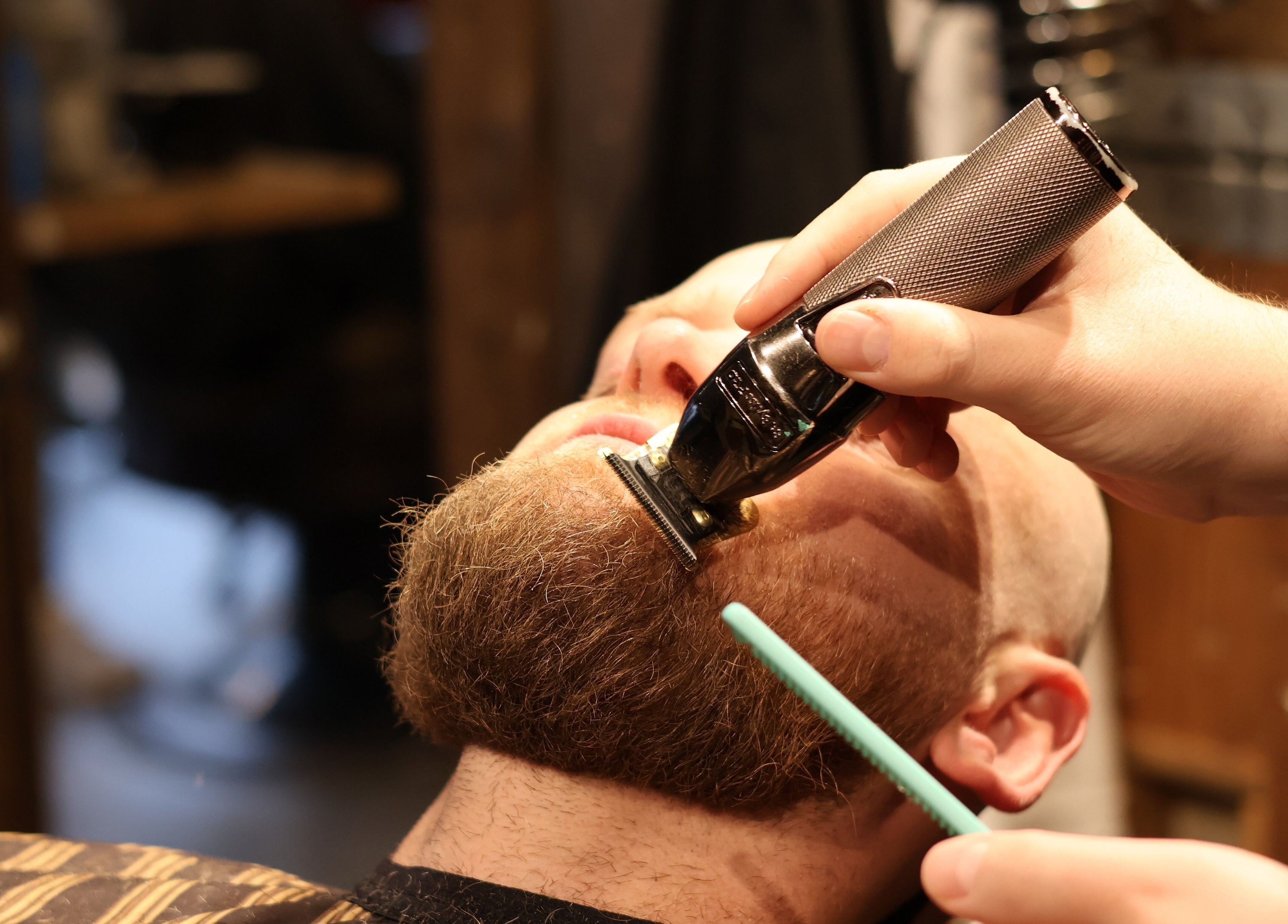 Expert beard grooming at Carlens Barbershop (Odense • Søndergade), Odense, DK. Experience skilled razor precision.