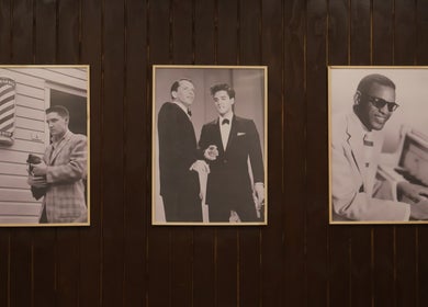 Vintage celebrity portraits on display at Carlsens Barbershop (Sønderborg • Jernbanegade), Sønderborg, DK.