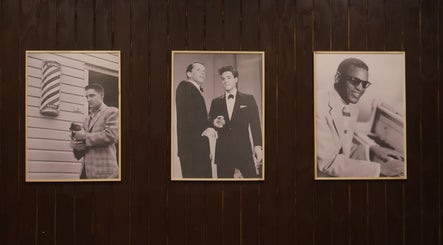 Vintage celebrity portraits on display at Carlsens Barbershop (Sønderborg • Jernbanegade), Sønderborg, DK.