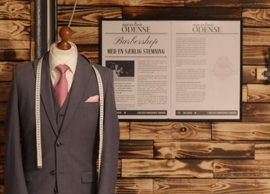 Tailored suit at Carlsens Barbershop (Odense • Kongensgade), Odense, DK, showcasing refined grooming style.
