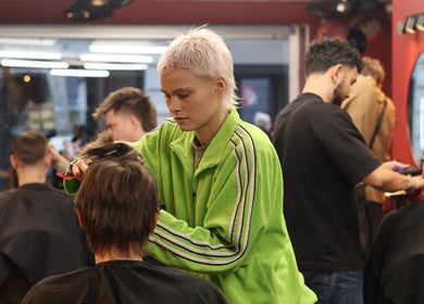 Stylist at Carlsens Barbershop (Aarhus • Frederiksgade) giving a haircut. Aarhus, DK.