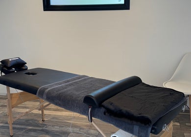 Massage table at NG Sports Massage Ballyclare in Doagh, Northern Ireland, GB, offering a tranquil ambiance.