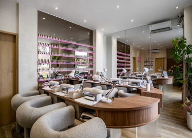 Modern nail salon interior at Nail Lesss, Bali, Bali, ID with elegant decor and manicure stations.