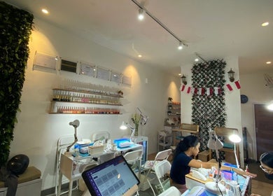 Cozy interior of Nail Lesss Monkey Forest in Bali, Bali, ID, showcasing nail stations and decor.