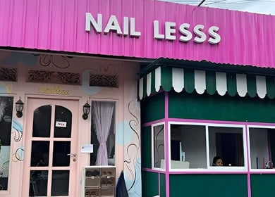 Vibrant exterior of Nail Lesss Sugriwa, Bali, Bali, ID, featuring pink decor and stylish signage.