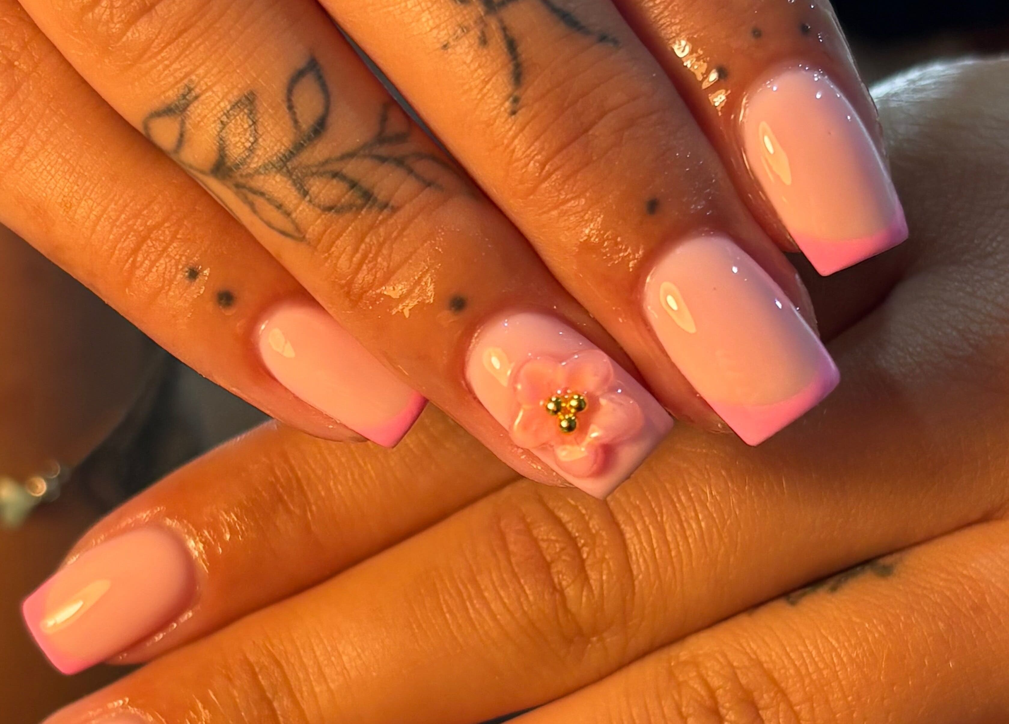 Elegant pink nails with floral design by Jess Ellis, Birkenhead, England, GB.