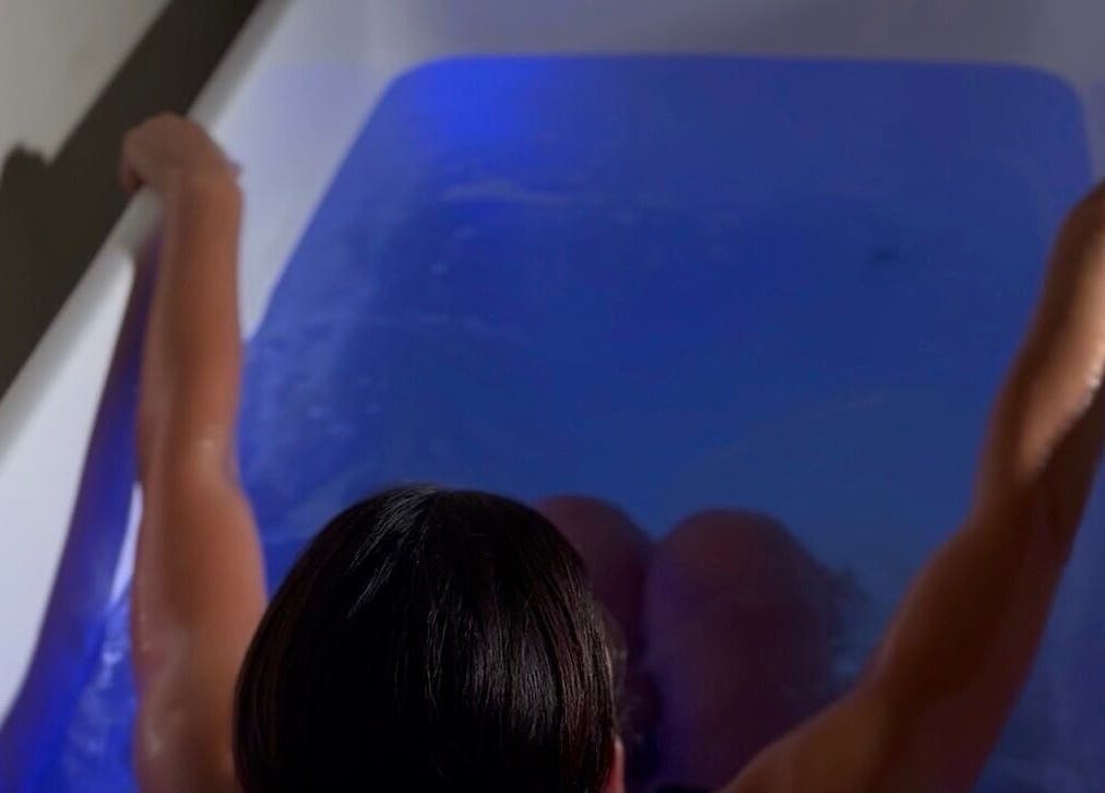 Relaxing bath experience at Skin & Scalp in Mississauga, Ontario, CA, featuring calming blue water.