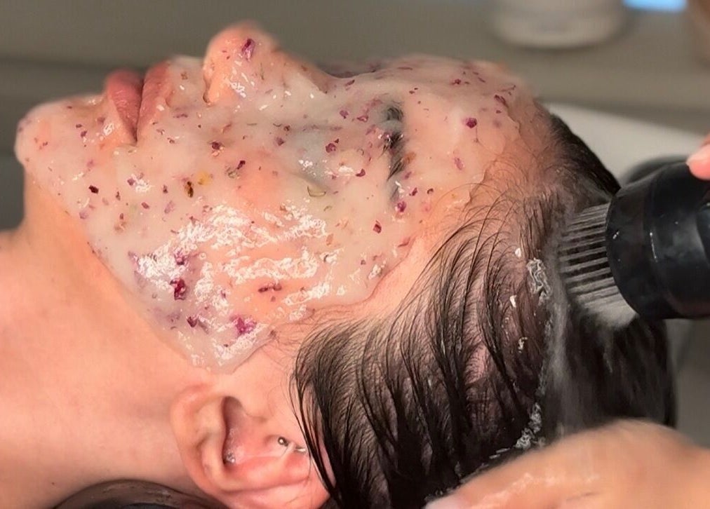 Facial treatment at Skin & Scalp, Mississauga, Ontario, CA; soothing mask with scalp care in spa setting.