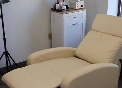 Comfortable recliner chair at Bymilauryss, New Brunswick, New Jersey, US, offering a soothing wellness experience.