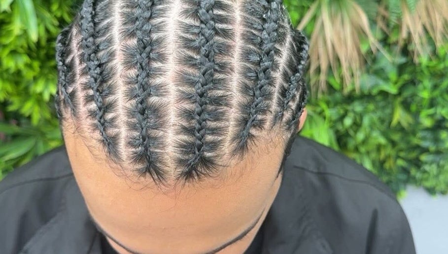 Intricate braids at Empress Beauty Empire in Manchester, England, GB, showcasing expert hair styling.