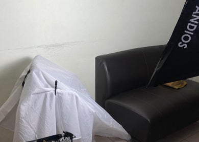 Interior view of Icee Barber in Kajang, Selangor, MY, showcasing elegant seating and professional lighting.