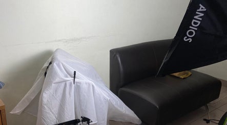 Interior view of Icee Barber in Kajang, Selangor, MY, showcasing elegant seating and professional lighting.