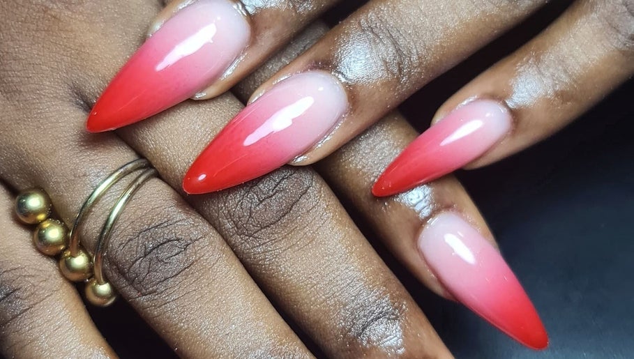 Elegant red gradient manicure at Suite 17, AATN Plaza, Bode, Bashorun, Ibadan, Oyo, NG.