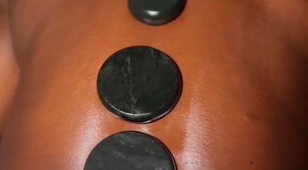 Hot stone therapy at Suite 17, AATN Plaza, Bode, Bashorun, Ibadan, offering relaxation in Ibadan, Oyo, NG.