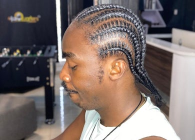 Intricate braided hairstyle at Suite 17, AATN Plaza, Bode, Bashorun, Ibadan, Oyo, NG.