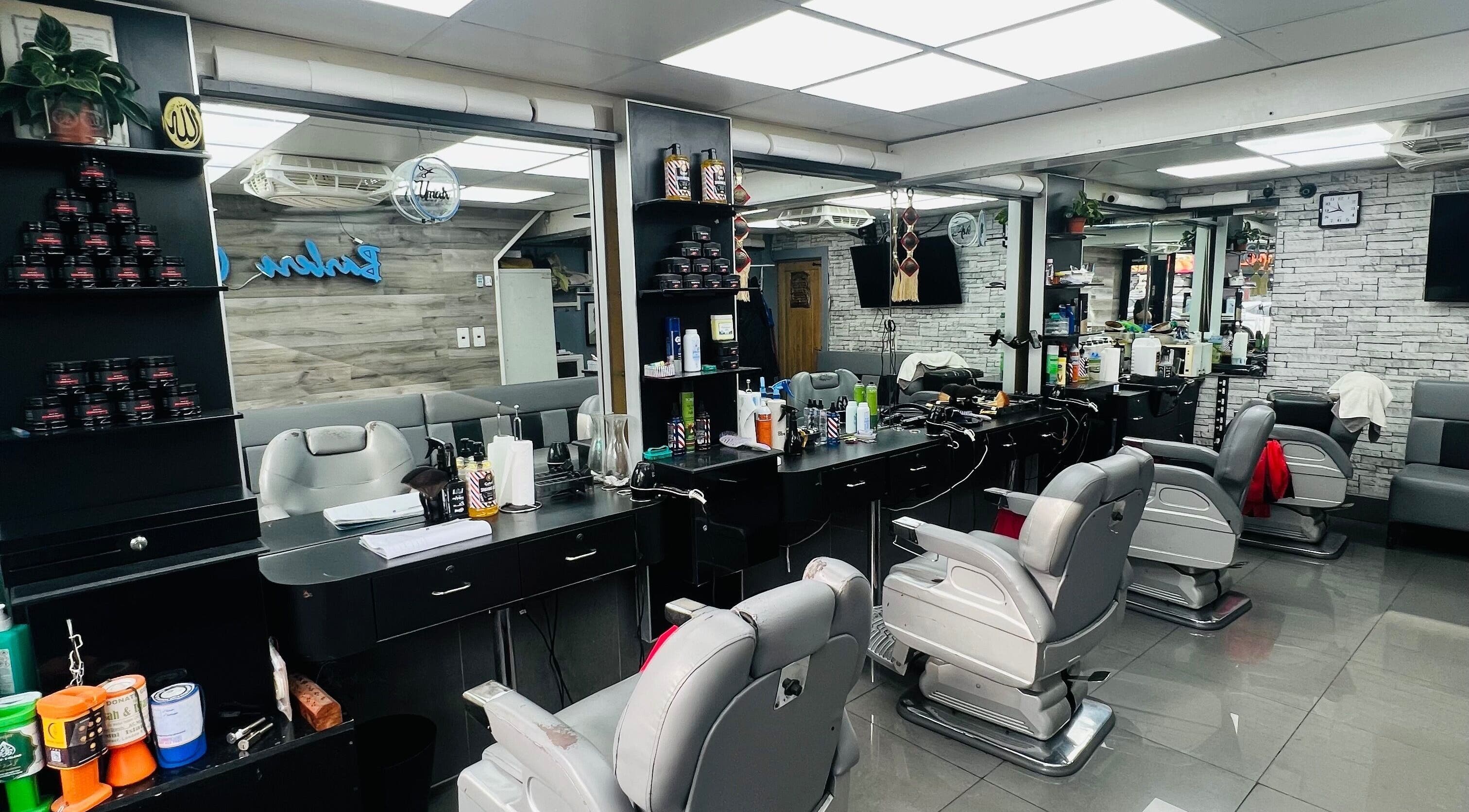 Modern salon interior at A1 Hair Style in London, England, GB with sleek styling stations and chairs.