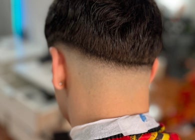 Close-up of a taper fade haircut at Cuality Barber, Rosario, Santa Fe, AR.