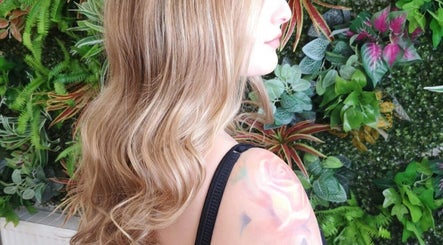 Blonde hair styled with waves at Hair by Elisa Salvatore, Kettering, England, GB.