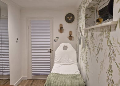 Relaxing spa room at Beauty by Basak in Nettleham, England, GB with a treatment bed and calming decor.