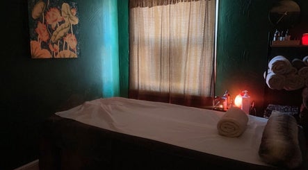 Cozy massage room at Ann’s Thai Massage in March, England, GB with serene lighting and decor.