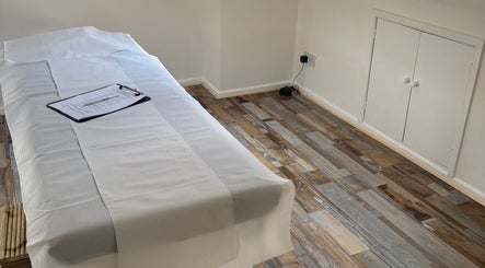 Calm treatment room at Js Semi Permanent Make Up By Jodie in Sturry, England. Features a restful massage bed.