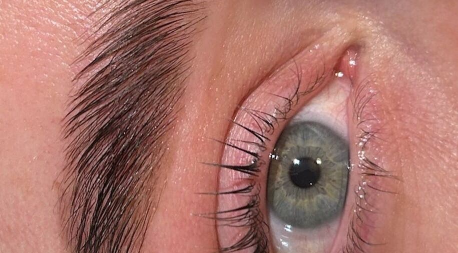 Close-up of expertly shaped eyebrow and lashes at Geneva Beauty, Weymouth, England, GB.