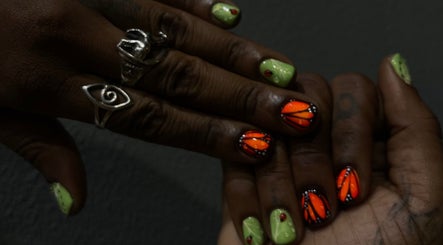 Colorful nail art at 44 Sculpted Nails, Kingston, St. Andrew Parish, JM, showcasing vibrant designs.