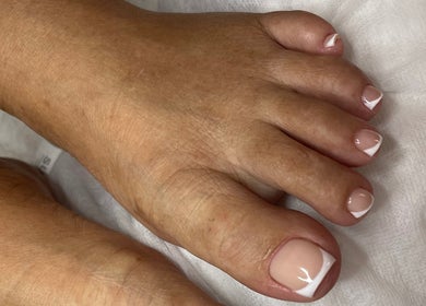 Fresh French pedicure at 44 Sculpted Nails, Kingston, St. Andrew Parish, JM showcasing stylish white tips.