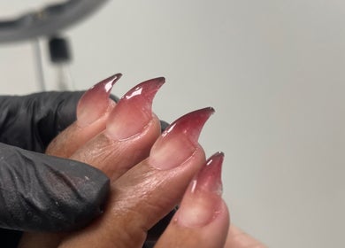 Stunning ombre nail art from 44 Sculpted Nails, Kingston, St. Andrew Parish, JM showcasing sharp acrylic tips.