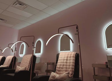 Luxurious treatment chairs at The Lash Boutique in Tukwila, Washington, US, under soft lighting.